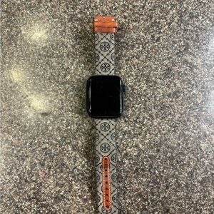 Apple Watch with Tory Burch band plus charger 
SERIES 6